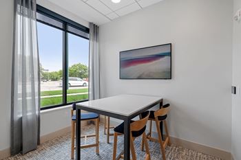 Coworking lounge with private meeting spaces